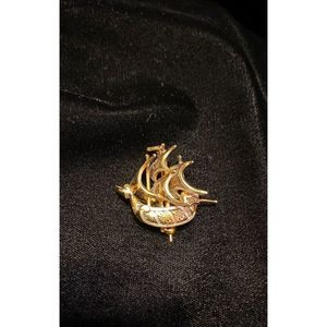 Ship brooch